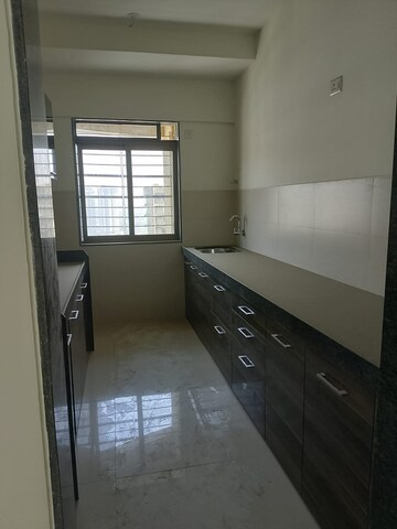 Kitchen in 2 BHK Apartment at Acme Ozone, Manpada – for Sale