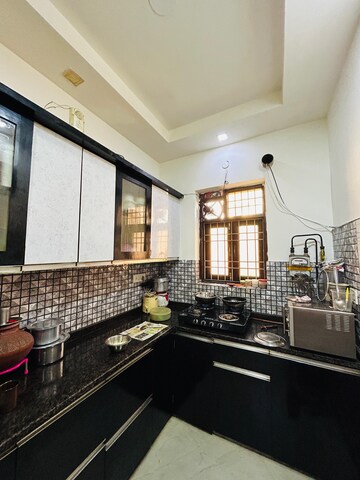 Kitchen in 2 BHK Apartment at Rohini Sector 25 – for Sale