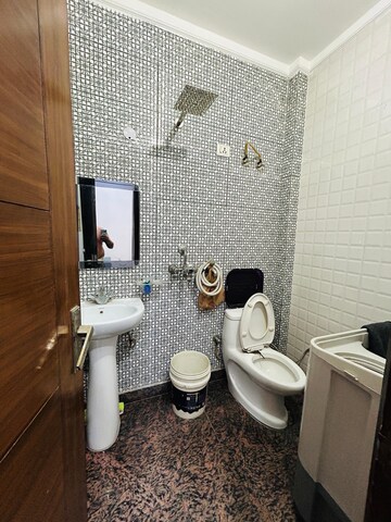 Bathroom in 2 BHK Apartment at Rohini Sector 25 – for Sale