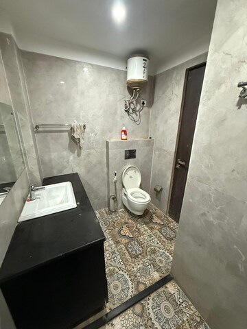 Bathroom in 3 BHK Apartment at Spire Wood, Sector 46 – for Rent
