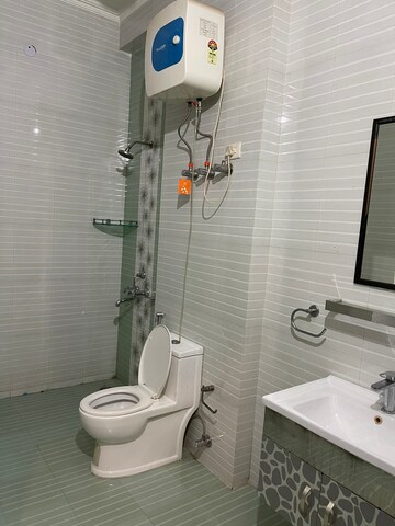 Bathroom in 3 BHK Apartment at Spire Wood, Sector 46 – for Rent