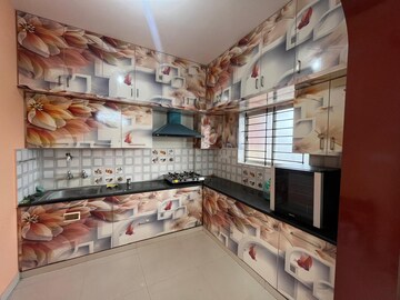 Kitchen in 2 BHK Apartment at Raja Rajeshwari Nagar – for Sale