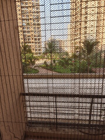 Living Room in 1 BHK Apartment at K Raheja Heights, Malad East – for Rent