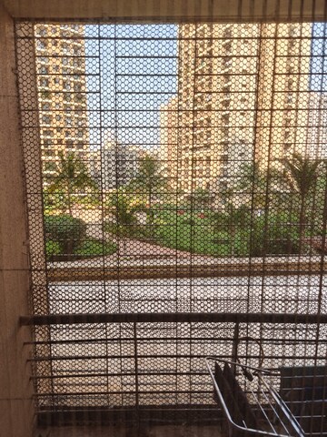 Living Room in 1 BHK Apartment at K Raheja Heights, Malad East – for Rent