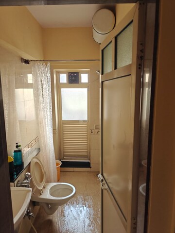 Bathroom in 1 BHK Apartment at K Raheja Heights, Malad East – for Rent