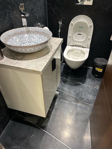 Bathroom in 4 BHK Builder Floor at DLF Atria, Dlf Phase ii – for Rent