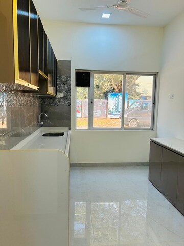 Kitchen in 1 BHK Builder Floor at Rasayani – for Sale