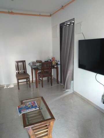 Living Room in 1.5 BHK Apartment at New Ambivali, Andheri West – for Rent