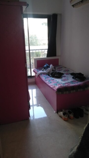 Bedroom in 1.5 BHK Apartment at New Ambivali, Andheri West – for Rent