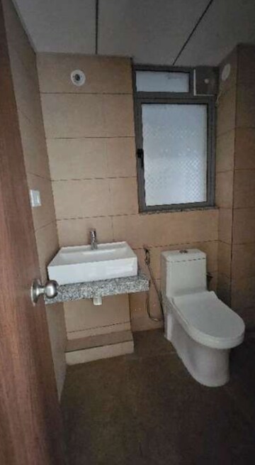 Bathroom in 2 BHK Apartment at Kalpataru Immensa, Kolshet Road – for Rent