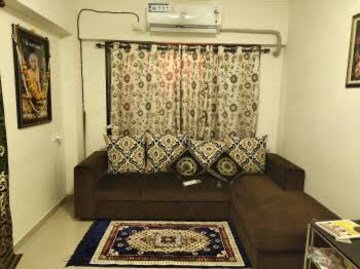 Living Room in 2 BHK Apartment at Cosmos Solitaire, Virar West – for Rent
