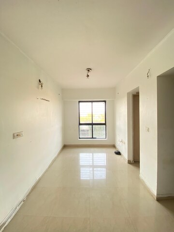 Living Room in 1 BHK Apartment at Lodha Crown Quality Homes Dombivli, Dombivli East – for Rent