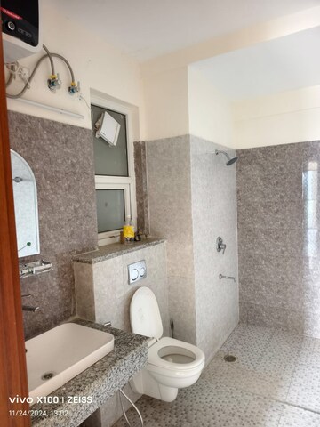 Bathroom in 3 BHK Apartment at Puri Diplomatic Greens Phase I, Sector 111 – for Rent