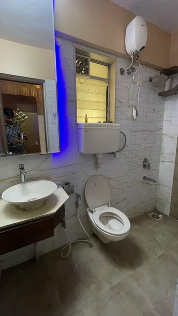 Bathroom in 2 BHK Apartment at Unique Signature Mumbai, Mira Road – for Rent