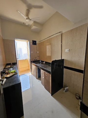 Kitchen in 2 BHK Apartment at K Raheja Heights, Malad East – for Rent