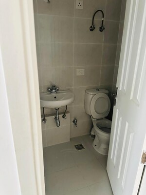 Bathroom in 4 BHK Apartment at BPTP Parkland Pride, Sector 77 – for Sale