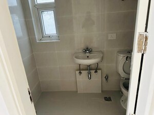 Bathroom in 4 BHK Apartment at BPTP Parkland Pride, Sector 77 – for Sale