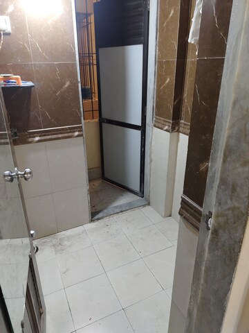 Bathroom in 1 BHK Apartment at Cirrus CHSL Cosmos Paradise, Vasant Vihar – for Rent