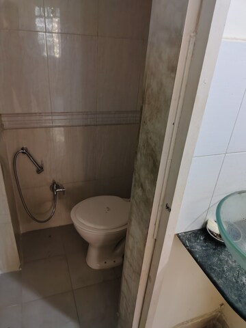 Bathroom in 1 BHK Apartment at Cirrus CHSL Cosmos Paradise, Vasant Vihar – for Rent