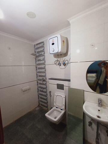 Bathroom in 3 BHK Builder Floor at Ansal Sushant Lok I, Sector 43 – for Rent