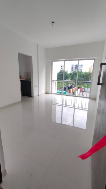 Living Room in 1 BHK Apartment at Godrej Vihaa, Badlapur East – for Rent