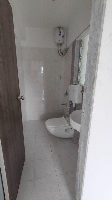 Bathroom in 1 BHK Apartment at Godrej Vihaa, Badlapur East – for Rent