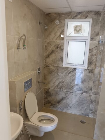 Bathroom in 3 BHK Apartment at Omaxe The Palace, Gomti Nagar – for Rent