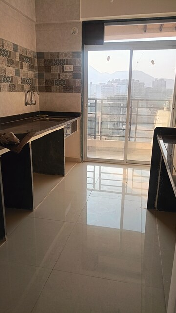 Kitchen in 2 BHK Apartment at Annapurna Sharmila Residency, Badlapur East – for Rent