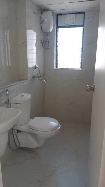 Bathroom in 1 BHK Apartment at Runwal Gardens, Dombivli East – for Rent