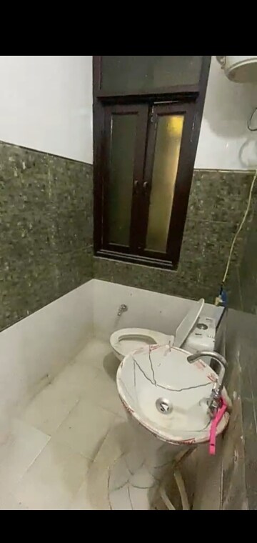 Bathroom in 2 BHK Builder Floor at Dwarka Mor – for Sale