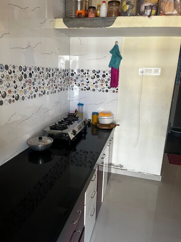 Kitchen in 1 BHK Apartment at Raj Tulsi City, Badlapur East – for Rent