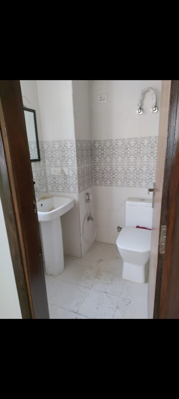 Bathroom in 3 BHK Apartment at Uninav Bliss, Raj Nagar Extension – for Rent