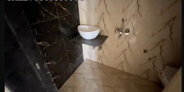 Bathroom in 1 BHK Apartment at Empire Homes, Ambernath – for Sale