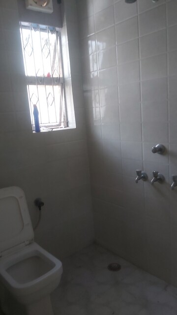 Attached Bathroom in 2.5 BHK Apartment at Uma Cooperative Society, Mayur Vihar 1 – for Rent