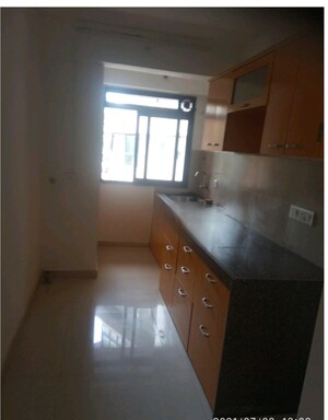 Kitchen in 2 BHK Apartment at Kanakia Rainforest, Andheri East – for Rent