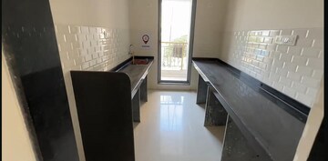 Kitchen in 2 BHK Apartment at Empire Homes, Ambernath – for Sale
