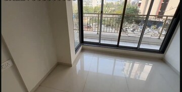 Room in 2 BHK Apartment at Empire Homes, Ambernath – for Sale