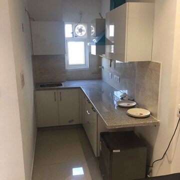 Kitchen in 1 BHK Apartment at Ajnara Daffodil, Sector 137 – for Rent
