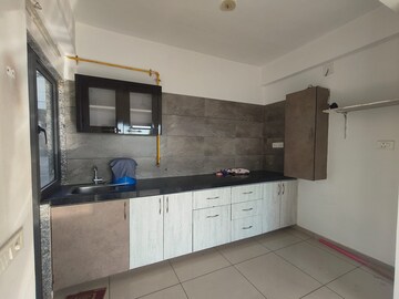 Kitchen in 2 BHK Apartment at JP Iscon Flower, Bopal – for Sale
