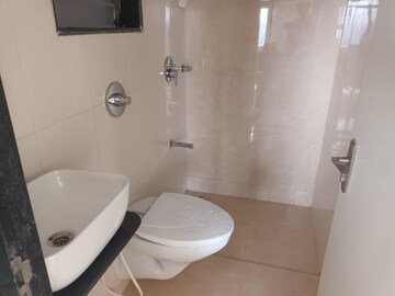 Bathroom in 1 BHK Apartment at Pranjee Garden City, Katrap – for Sale