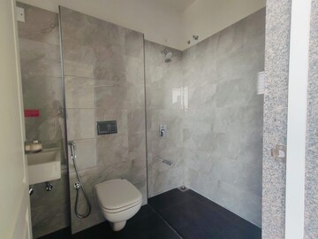 Bathroom in 3 BHK Apartment at Goyal Riviera Aspire, Shela – for Rent