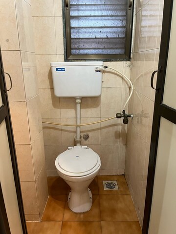 Bathroom in 1 BHK Apartment at Gayatri Corner, Kandivali East – for Rent