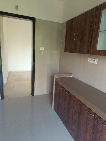 Kitchen in 2 BHK Apartment at Dosti Group Imperia, Manpada – for Sale