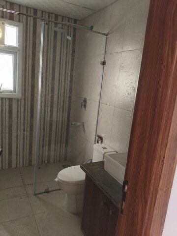 Bathroom in 3 BHK Apartment at Central Park Flower Valley Aqua Front Towers, Sohna Sector 33 – for Rent