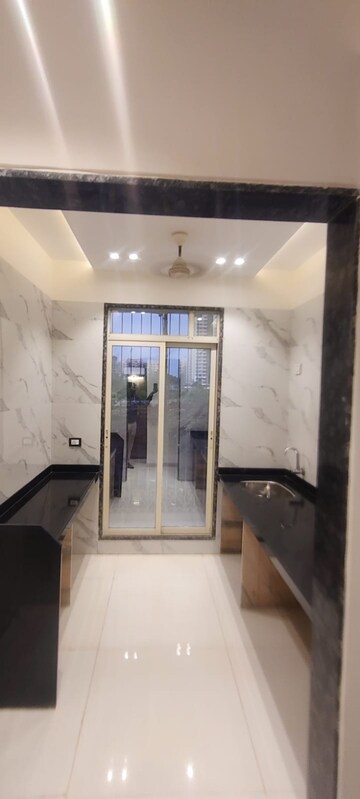 Kitchen in 1 BHK Apartment at Precious Empire, Pale Gaon – for Sale