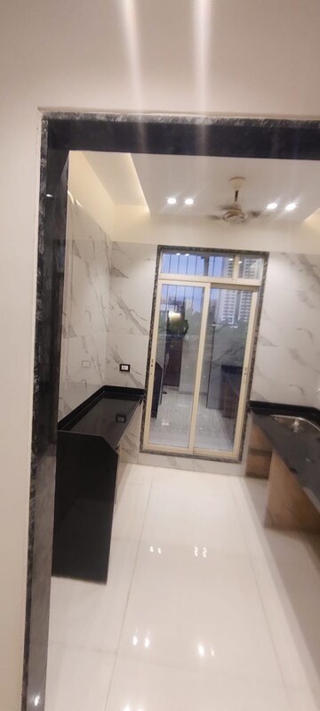 Kitchen in 1 BHK Apartment at Precious Empire, Pale Gaon – for Sale