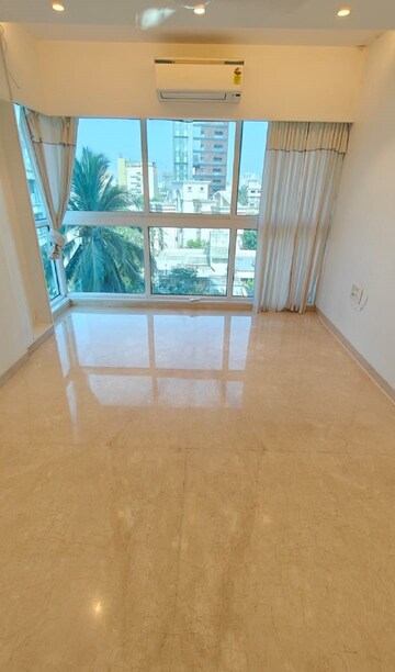 Living Room in 2 BHK Apartment at Bandra West – for Rent