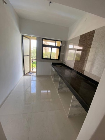 Kitchen in 1 BHK Apartment at Cosmos Meluha, Shilphata – for Rent