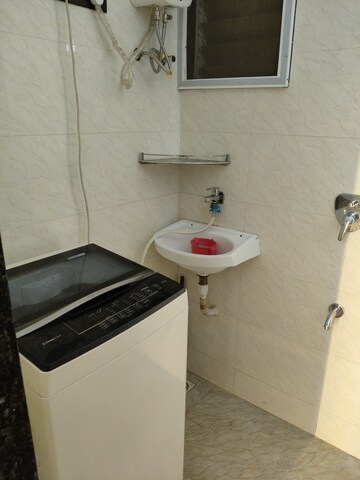 Bathroom in 2 BHK Apartment at Kopar Khairane – for Sale