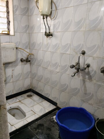 Bathroom in 2 BHK Apartment at Alpa Park CHS, Ghatkopar West – for Rent